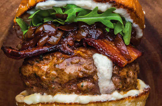 Goat Cheese Stuffed Lamb Burgers with Caramelized Red Onions