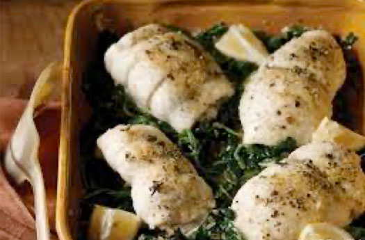 Spinach Stuffed Flounder with Cream Sauce